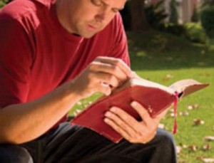 student reading Bible